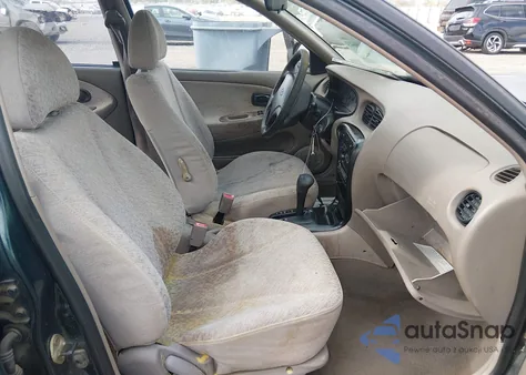 1999 Hyundai Elantra Gl z USA, uszkodzony, nr VIN KMHJF25F5XU869591